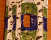 Birch or  loon switch plate cover handmade in USA from a lump of clay totally unique