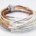 Bracelet---Metallic Leather with Silver Tube Accents