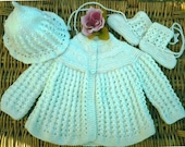 Baby's traditional pale green / mint lace matinee jacket, hat and bootee set.