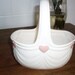 Vintage Valentines day basket with pink hearts
