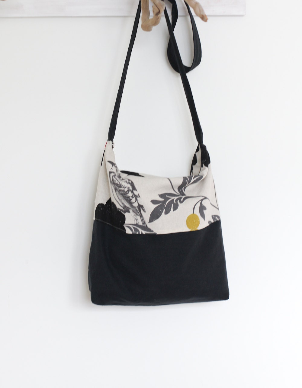 Black and Beige cross body bag.