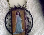 Assemblage rocker farmchick style pendant with vintage image and upcyled elements