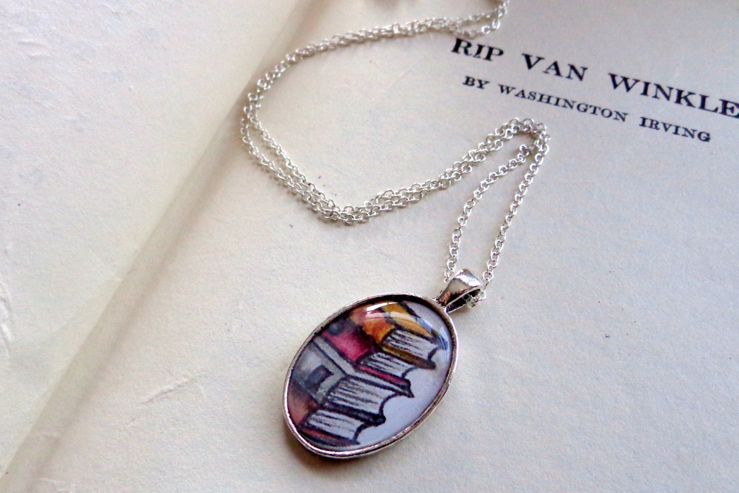 Read.  Stack of Books Drawing.  Silver Art Necklace.
