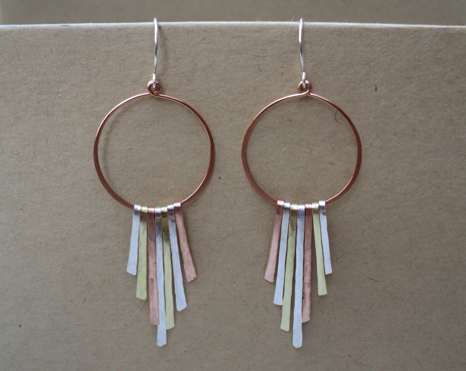 Mixed metal hoop with sterling silver, copper and brass hand hammered "dangles". Mixed metal fan. Long asymmetrical sexy hoop earrings.