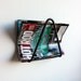 Hairpin magazine rack