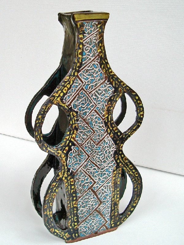 hand carved vase ceramic pottery