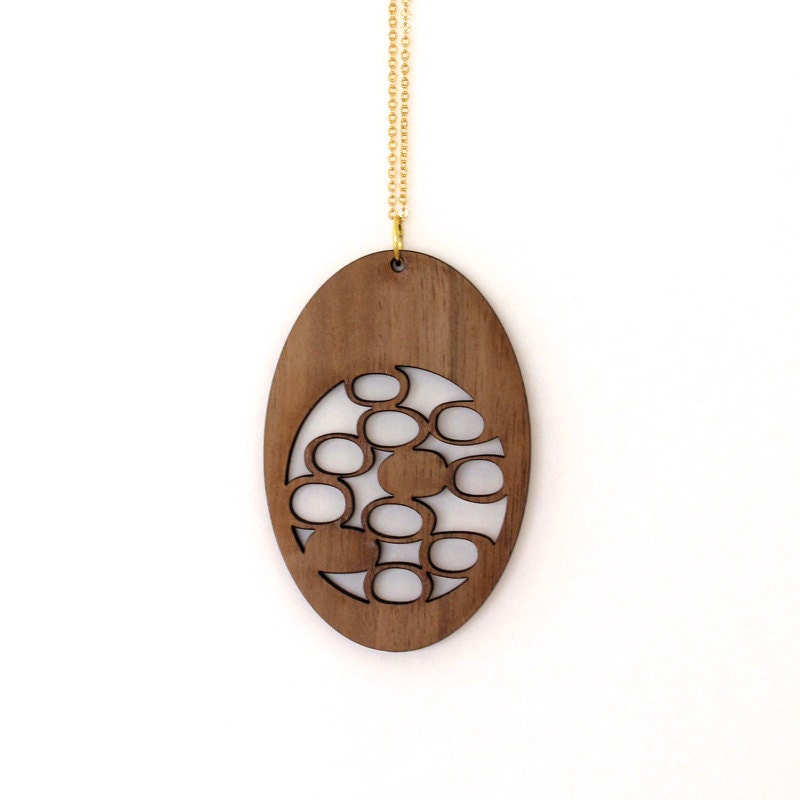 Statement wood cut pendant from sustainable walnut wood with pebble design