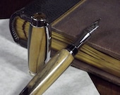Handmade Commissioner fountain pen in black and white ebony with chrome hardware
