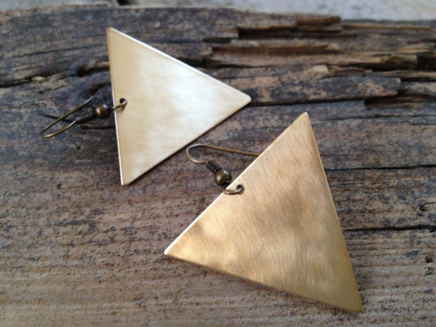 The Equilateral Earrings Geometric large triangles in gold brushed sanded brass