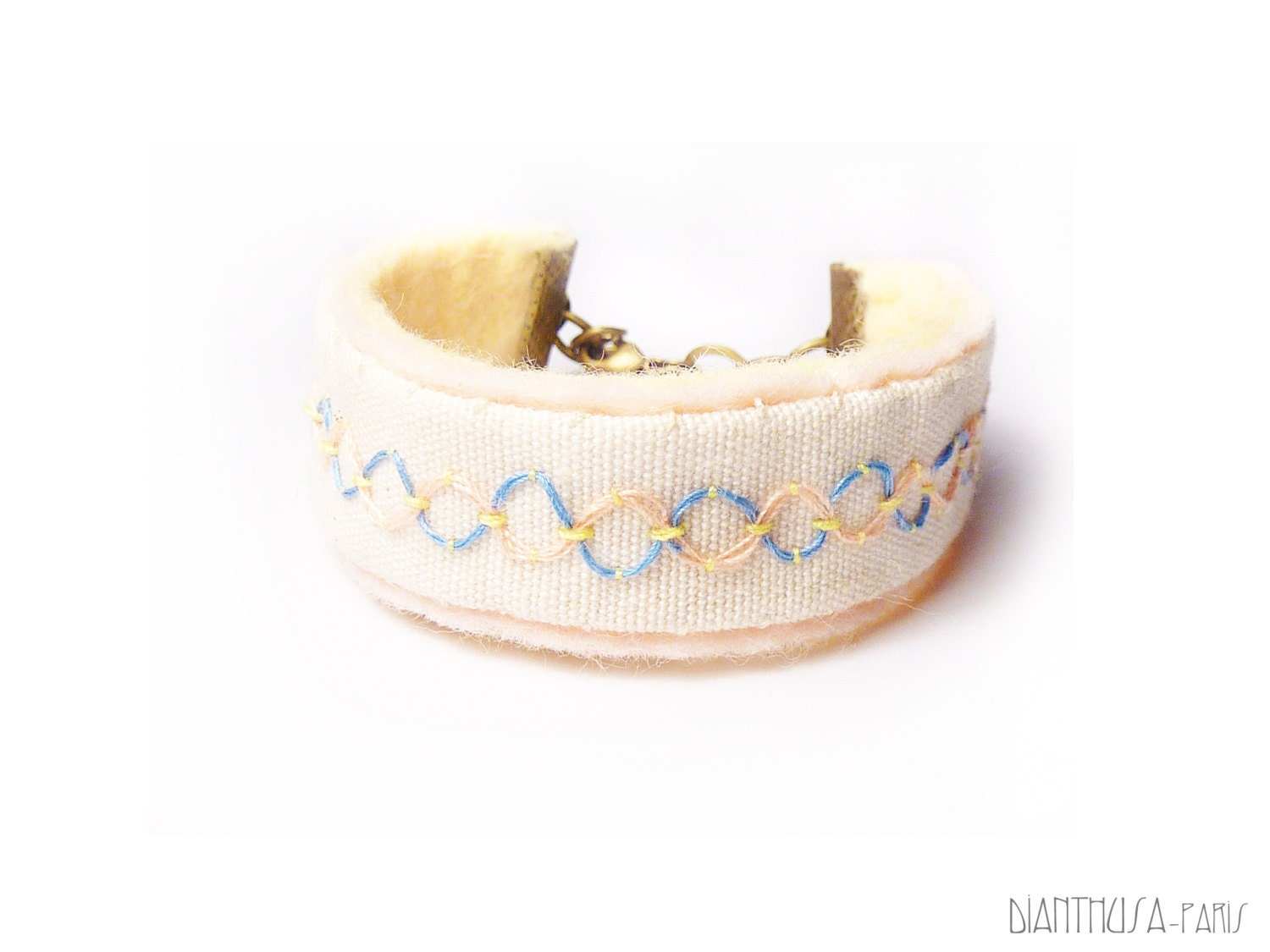 Felt embroidered bracelet. Pink, white, blue, yellow. Pastel colors for spring and summer. Hand embroidery