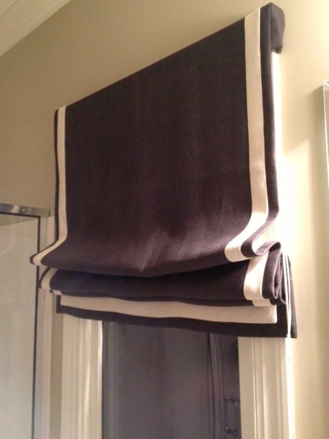 Custom made roman shade window treatment