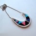 Asymmetrical embroidered necklace crescent moon pendant in blue hot pink black and gray