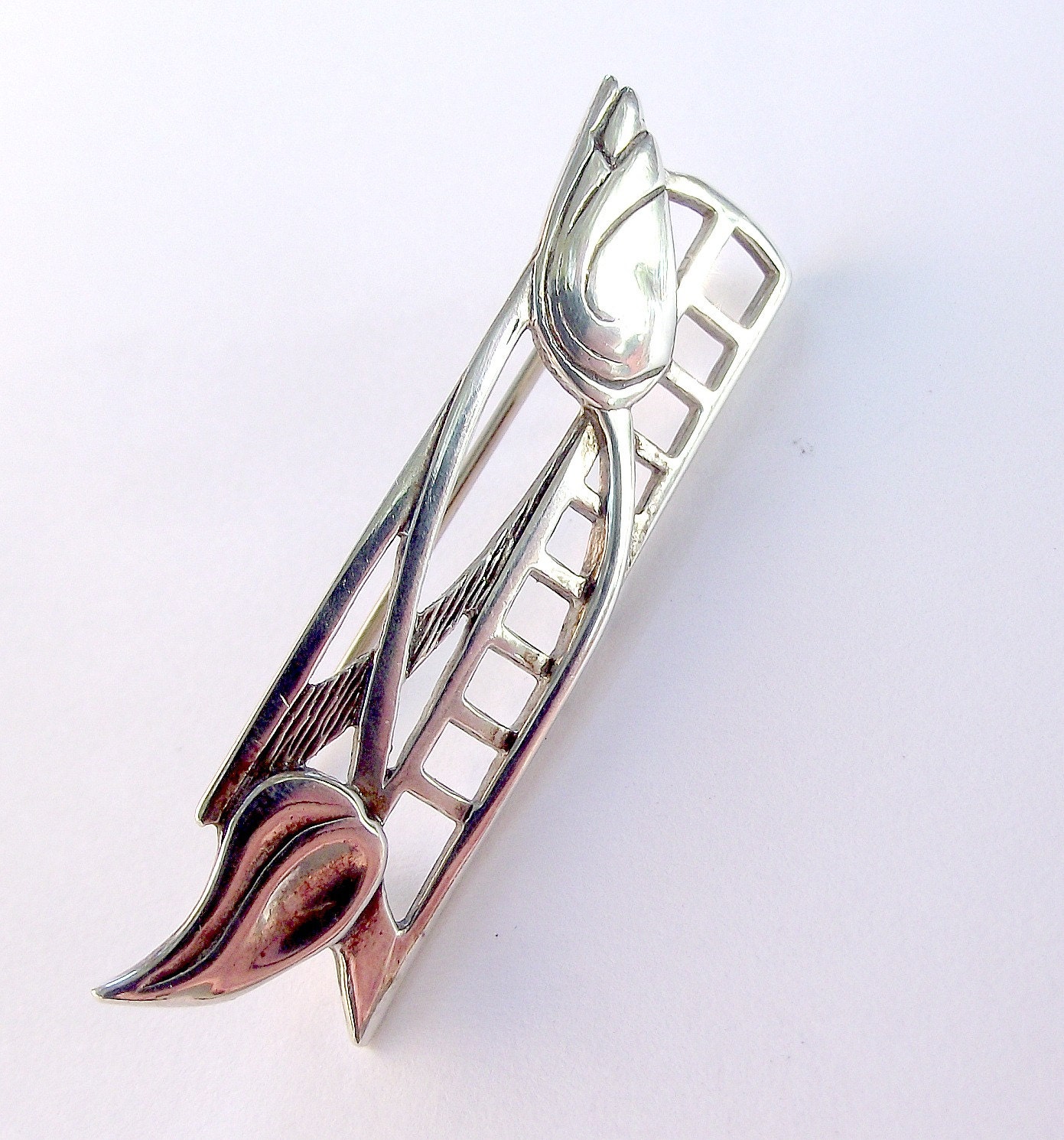 Silver brooch. Art deco style.  Charles Rennie Makintosh style. Glasgow rose.