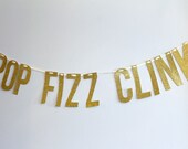 gold glitter POP FIZZ CLINK banner garland decoration