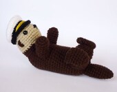 Sea otter plushie with accessories