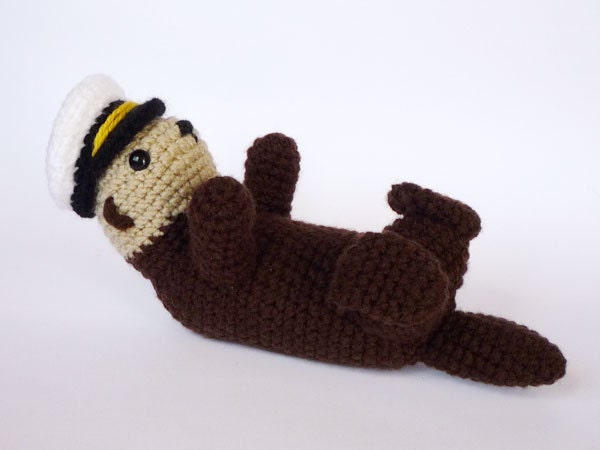 Sea otter plushie with accessories