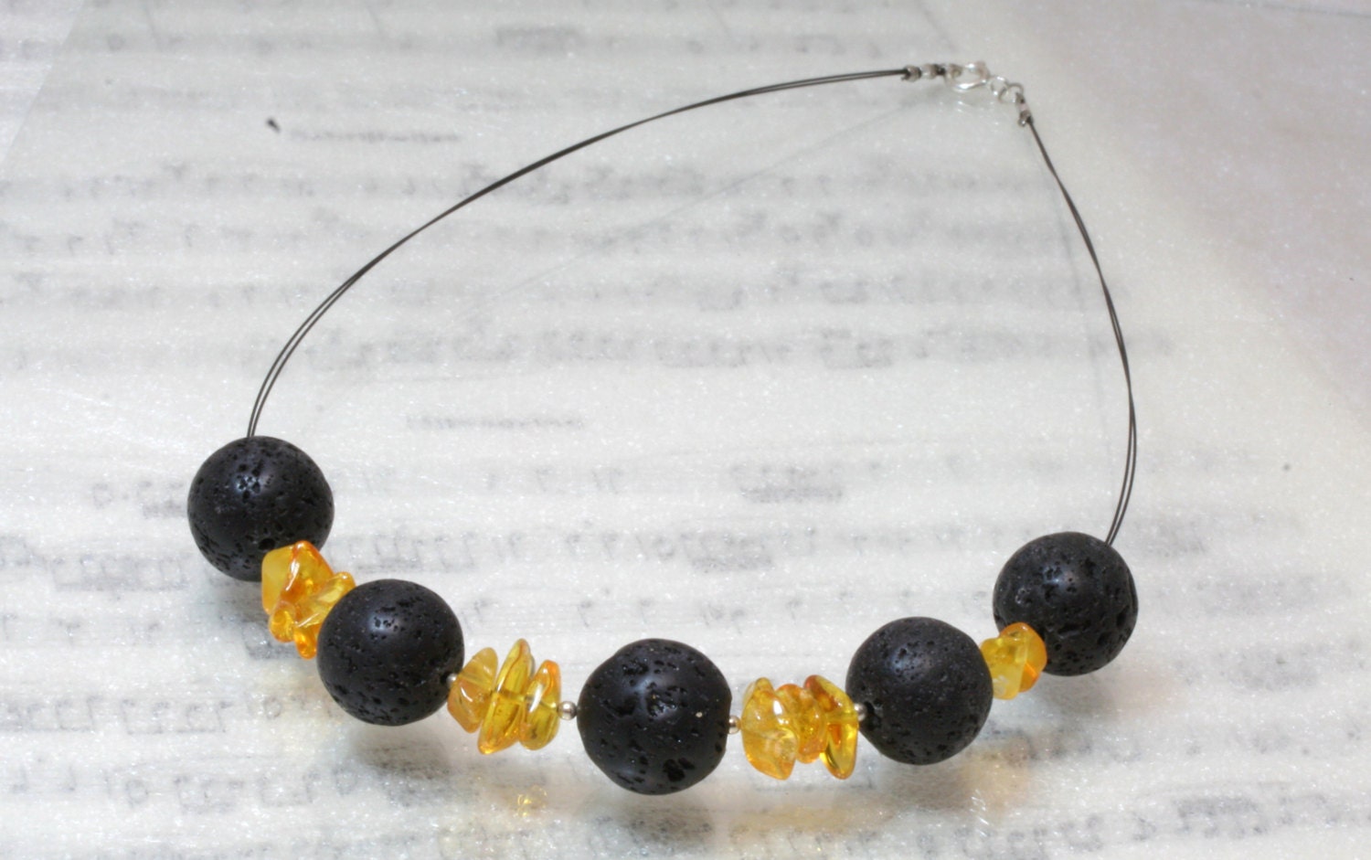 Black lava with honey amber necklace
