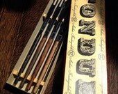 Vintage stainless steel fondue forks in their original boxes from Heal's the famous store in London