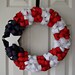 Patriotic red white and blue ribbon wreath