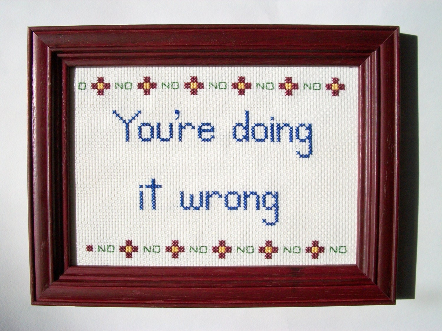ORIGINAL You're Doing It Wrong cross stitch -- 5x7 framed with flower motif and No No No border