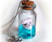 Polar bear on an iceberg bottle necklace