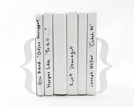 Bookends - Brackets - laser cut for precision out of metal thick enough to hold a bunch of books.