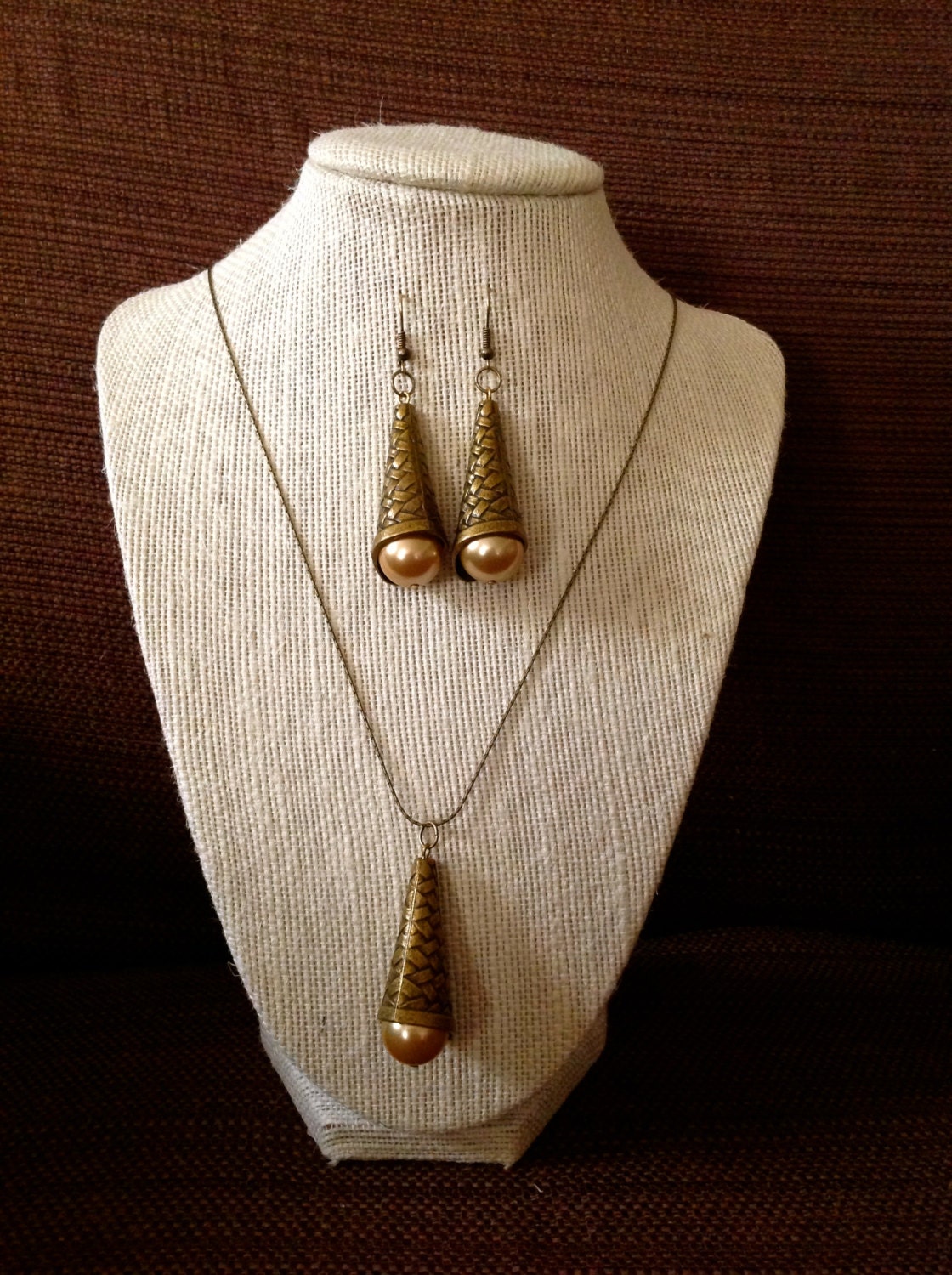 Handmade necklace and earring set, brass textured metal cone with gold shell pearl on stringing chain