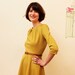 Dress "Elisa", with a round skirt and little falts in green-yellow