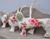 Dachshund sausage dog hanger, lavender scented in cream floral spot fabric