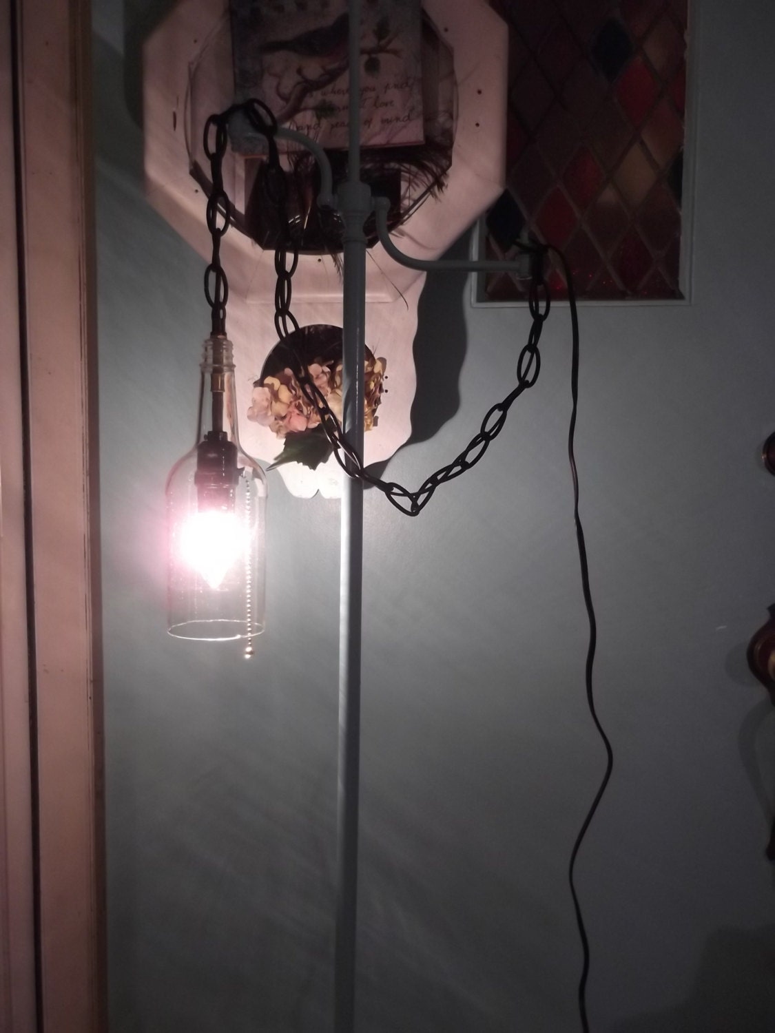 steampunk wine bottle light, bottle swag, black chain, urban lighting