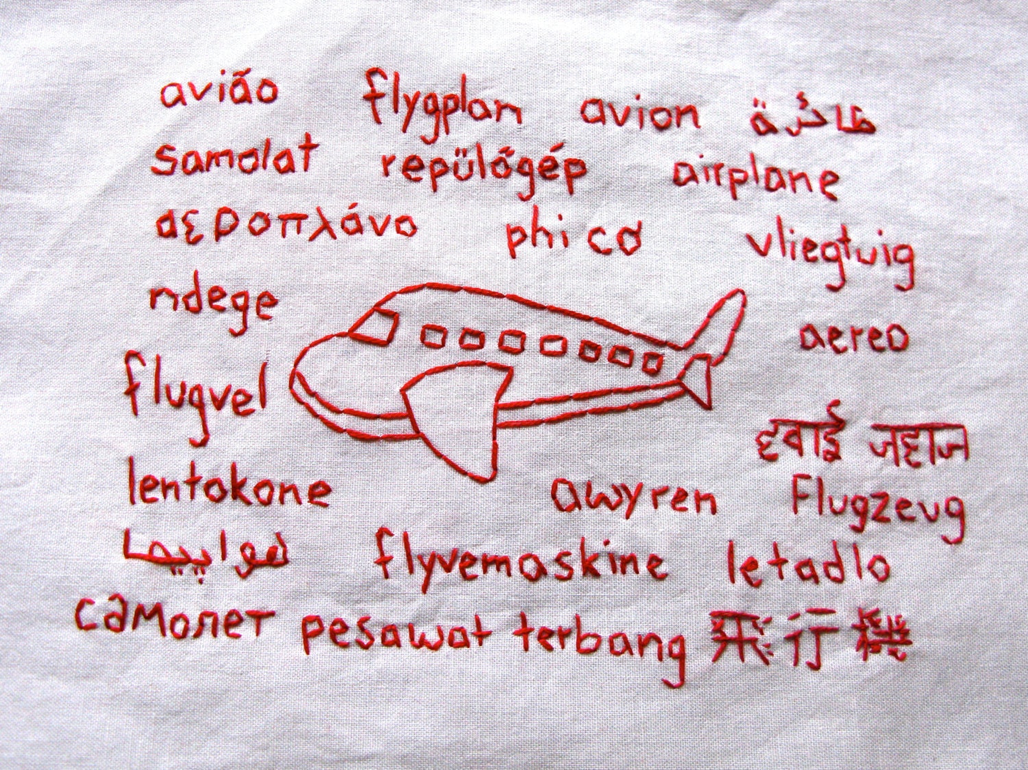 Polyglot Airplane Embroidery with World Languages