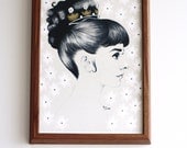 Audrey Hepburn with a bun