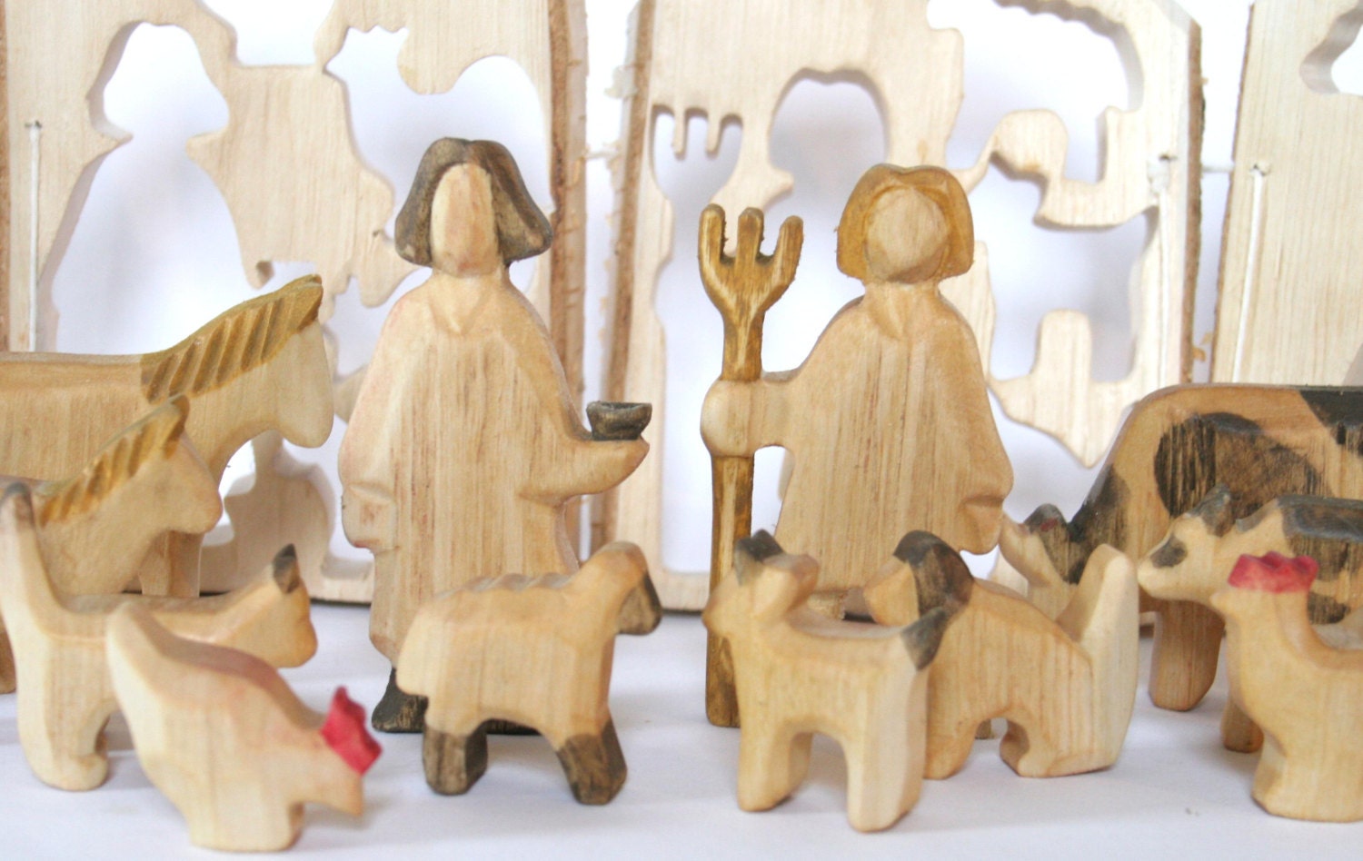 Farmer, Wife and Animals, handmade from one tree trunk,