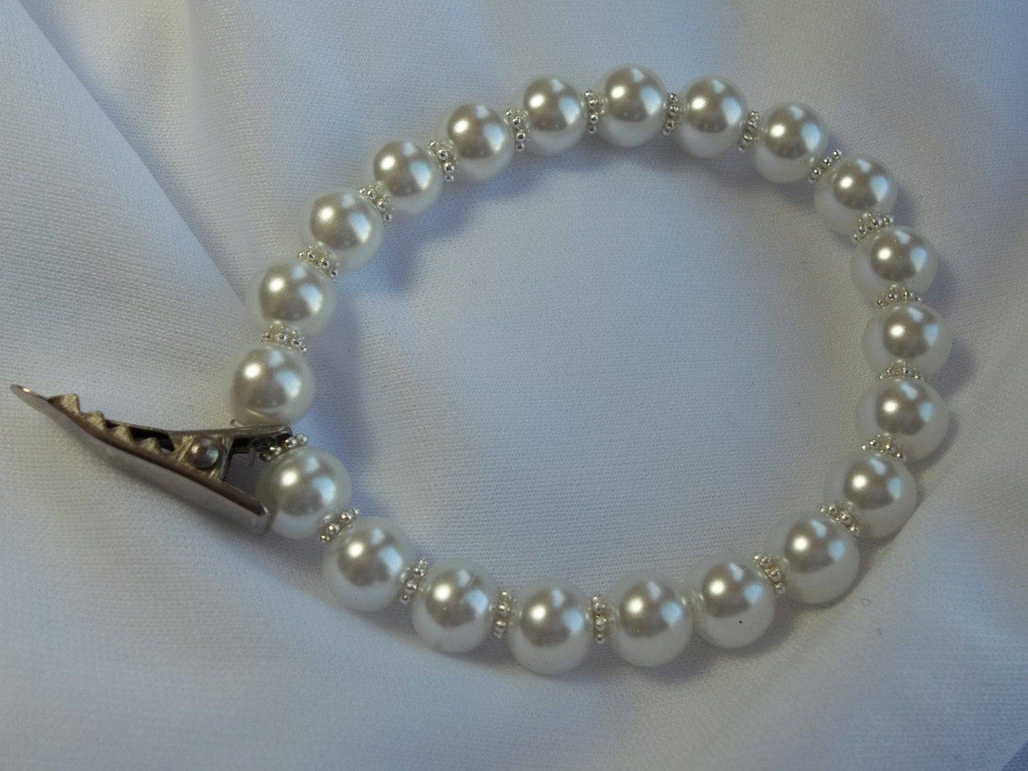 Genuine cool toned (bright white) pearl and silver spacer temple bracelet