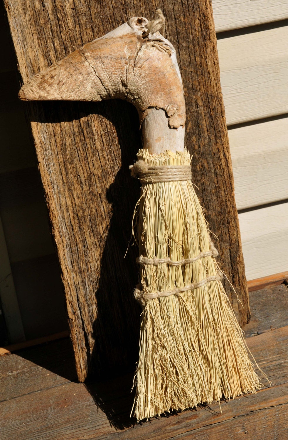 Handmade primitive driftwood whisk broom with hemp cord.