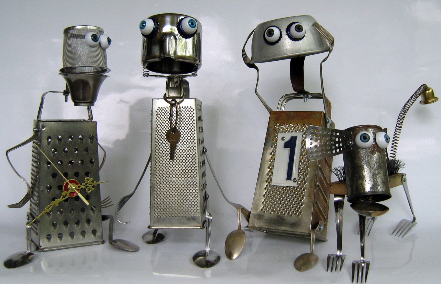 RECYCLED  ROBOT  SCULPTURES  -  "Grater brothers with dog"   - reused repurposed green art