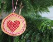 Cross stitched heart Cypress wood ornament.