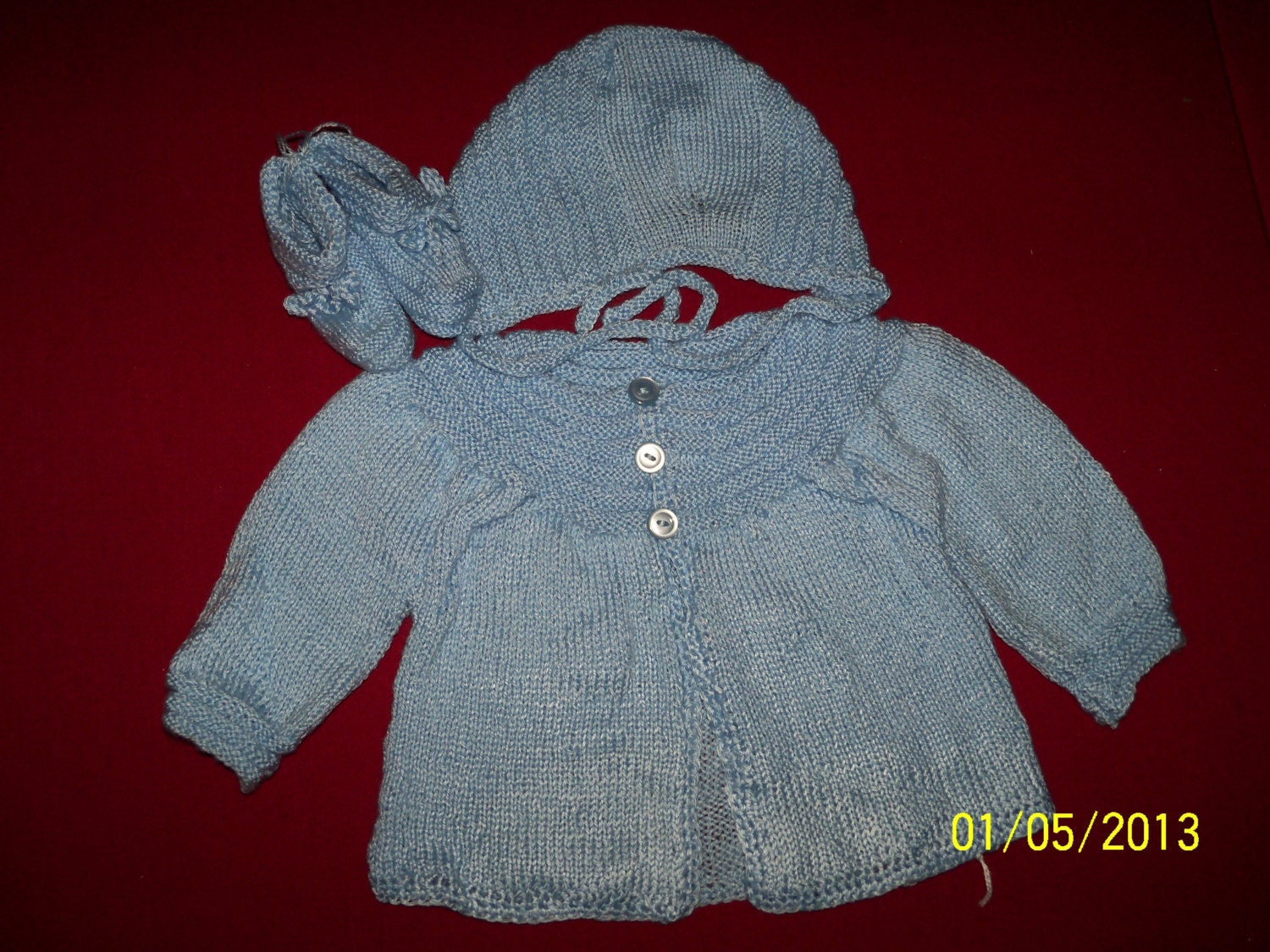 Infant ribbed sweater with hat and booties. For newborn to one year.