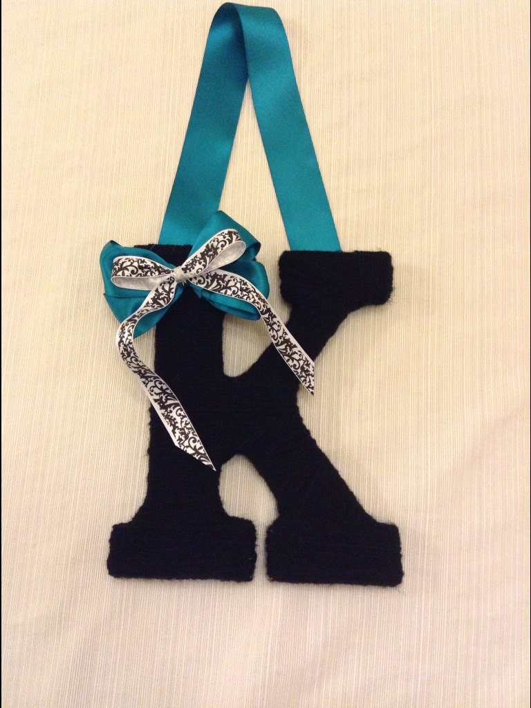 Yarn wrapped letter. adorded with a beautiul bow. Personalized Initial Wall Decor - your choice of color and ribbon styles