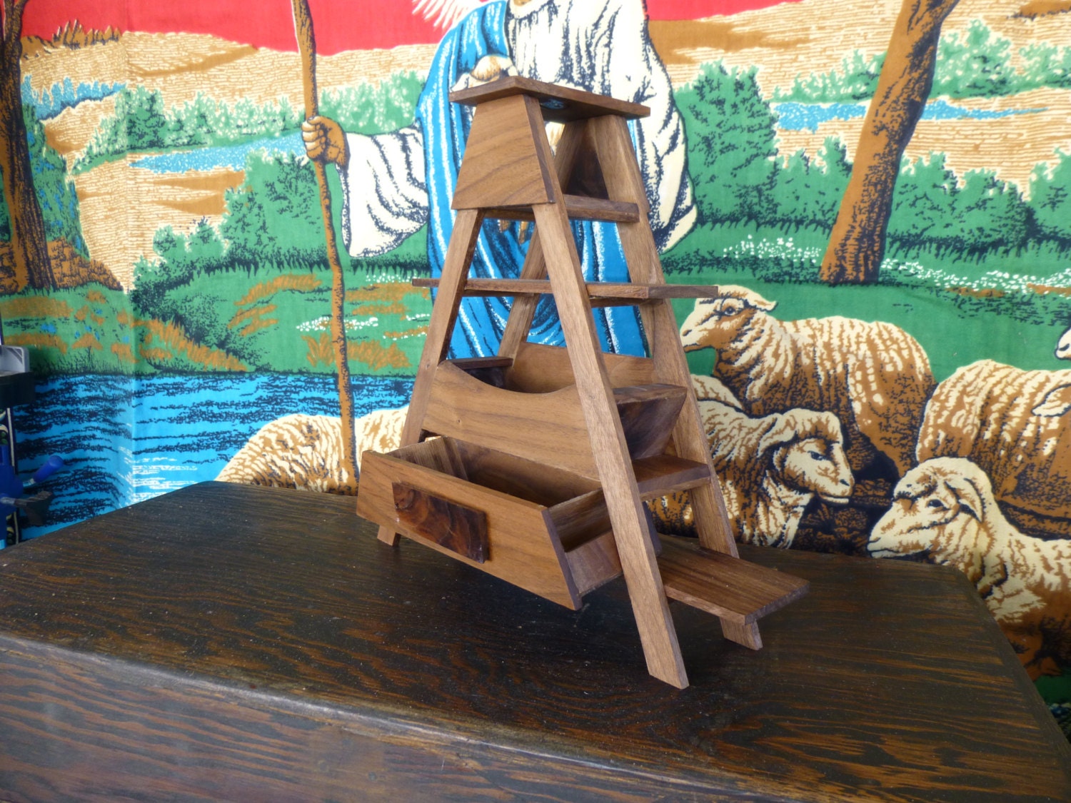 Solid walnut men's dresser ladder with change trough and drawer.