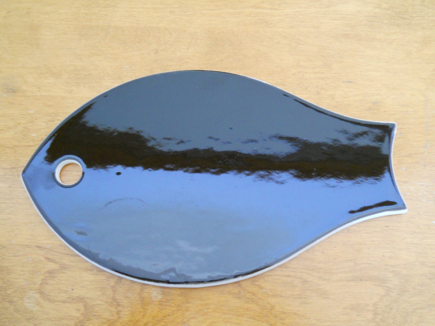 black ARABIA FINLAND FISH trivet (or cheese plate)