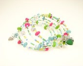 Silver filigree charm bracelet. Mint green fuchsia multistrand bracelet. Gemstone, silver plated. Key charm, heart charm