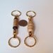 Handmade Key Chains featuring whale bone and baleen. One key ring is detatchable from the main 'key chain'.