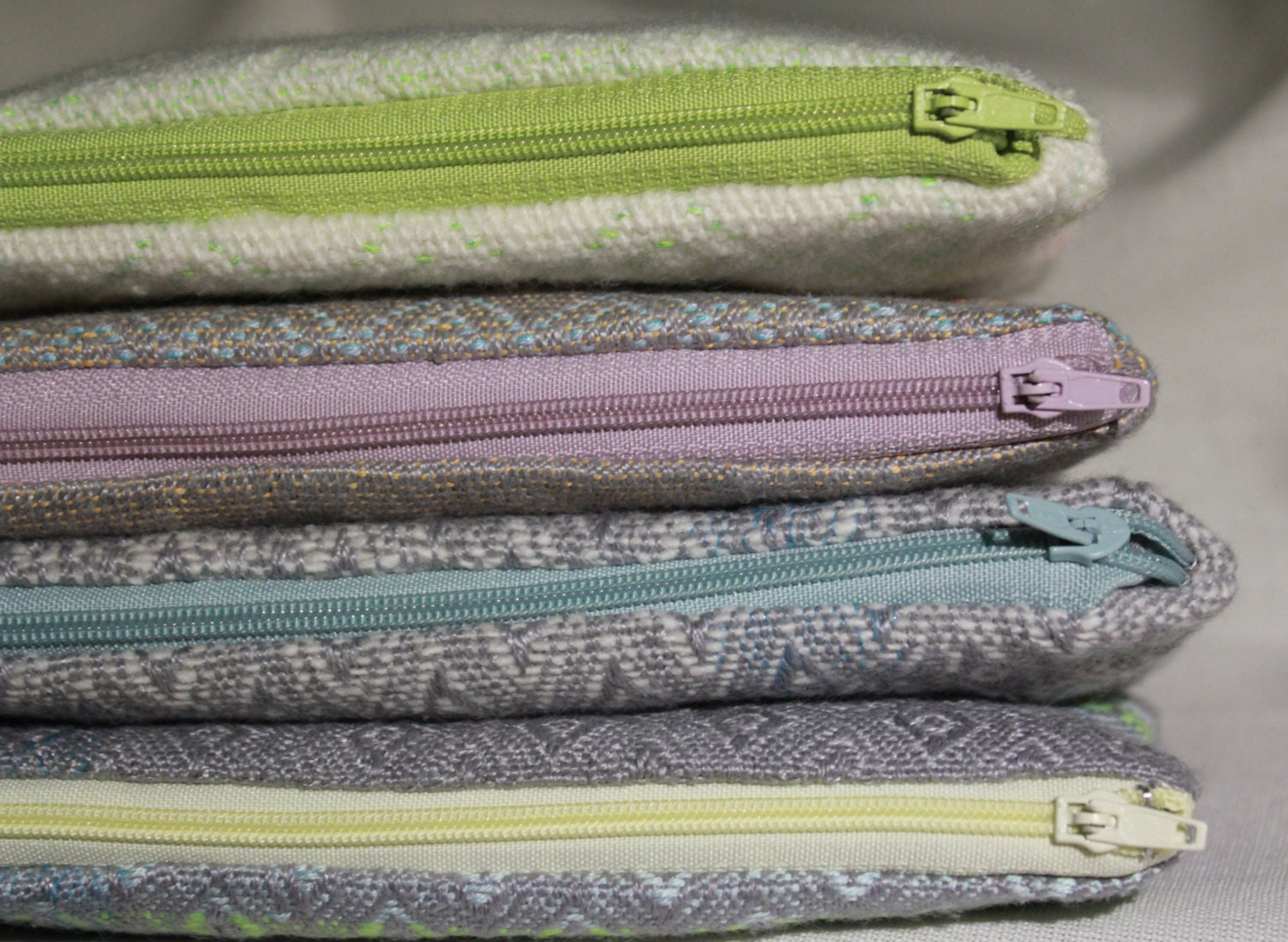 Hand woven textile zip purse collection priced individually.