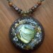 Orgone pendant green mother of pearl