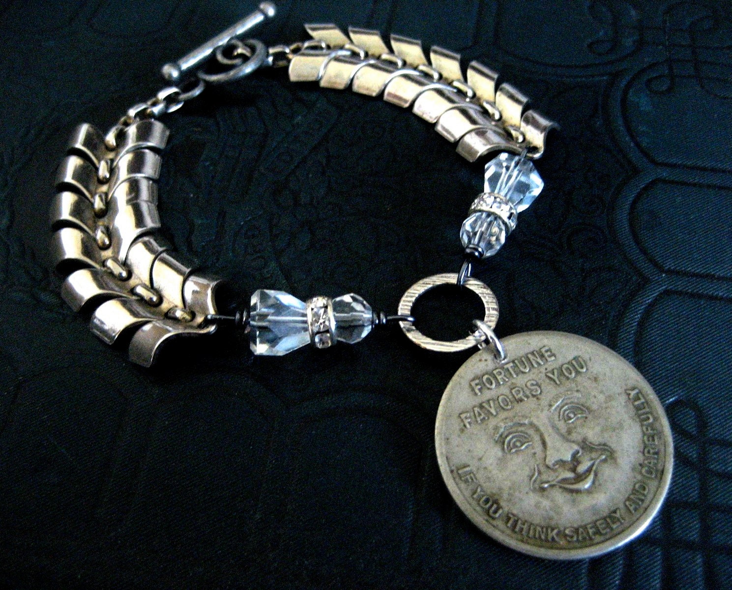 fortune favors you - vintage advertising token assemblage bracelet