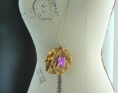 Irene Necklace. Brown and purple flower pendant on long chain necklace handmade by Cardinal House.