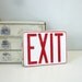 vintage small metal exit sign