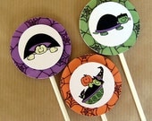 halloween turtle costume birthday party cupcake cake toppers decorations - witch, vampire, and frankenturtle - set of 12