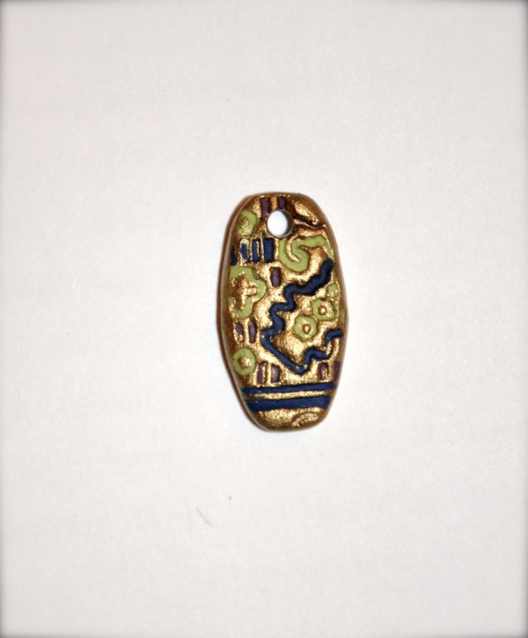 Handmade Clay Pendant - gold tribal pattern